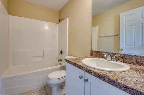 217 Ivan Ave, Lehigh Acres FL 33973-2011 exterior