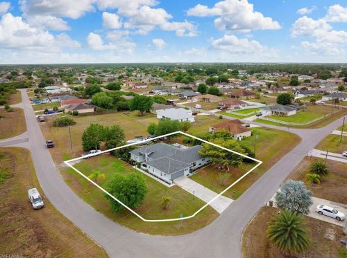 1023 Carl Ave, Lehigh Acres FL 33971-8523 exterior