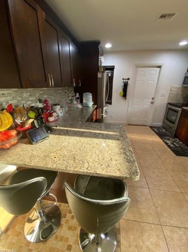 417 Valley Dr, Lehigh Acres, FL 33936-7311