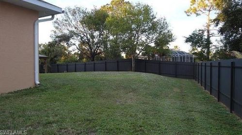 709 Connecticut Ln, Lehigh Acres FL 33936-7803 exterior