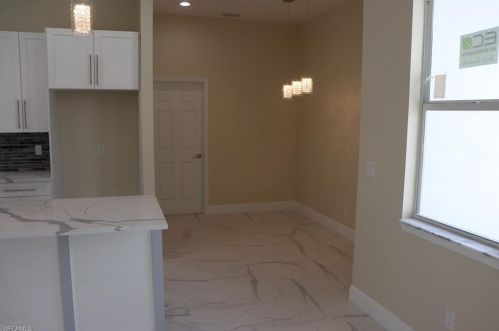 827 Sunrise Blvd, Lehigh Acres FL 33974-9795 exterior