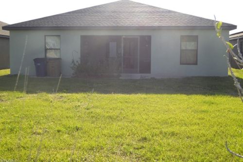 213 Shadow Lakes Dr, Lehigh Acres FL  33974-0806 exterior
