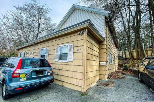 669 Cedar Swamp Rd, Muttontown, NY 11545-2234