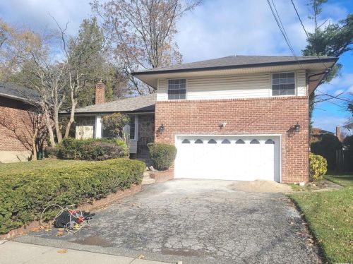 49 Ridge Dr, Westbury, NY 11590-2720