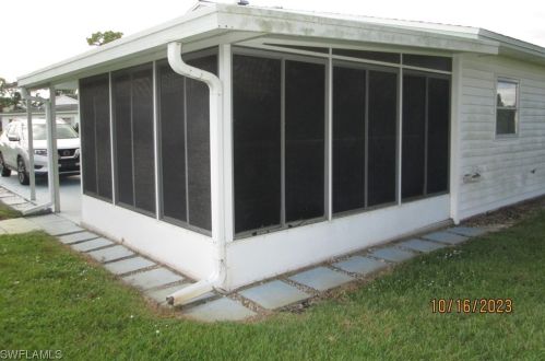 25 Dawn Flower Cir, Lehigh Acres FL 33936-7356 exterior