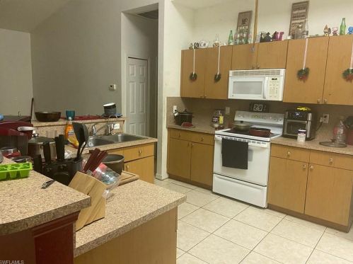 716 Bering Ave, Lehigh Acres, FL 33974-9789