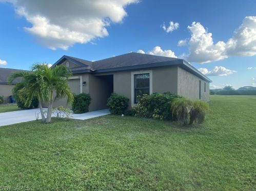 704 Evening Shade Ln, Lehigh Acres, FL 33974-0809