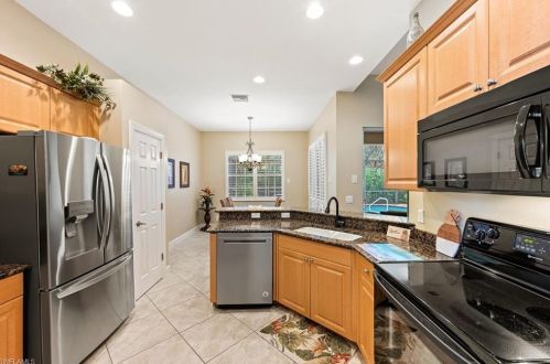 15892 Delaplata Ln, Naples FL 34110-2804 exterior