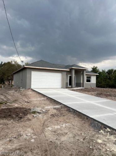527 Harry Thayer Ave, Lehigh Acres, FL 33974-9663
