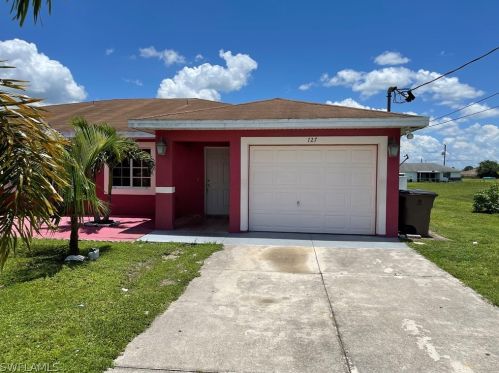725 Hightower Ave, Lehigh Acres, FL 33973-2694