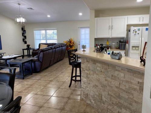 145 Peerless St, Lehigh Acres FL 33974-9455 exterior