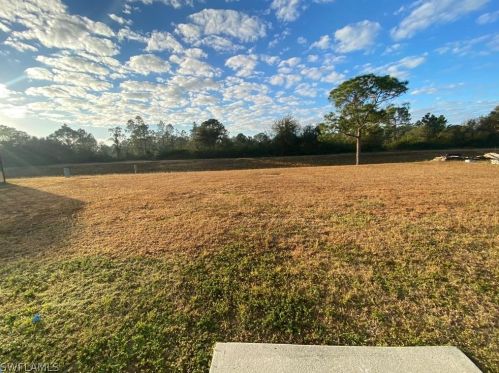 417 Candlewick Cir, Lehigh Acres FL  33936-7743 exterior