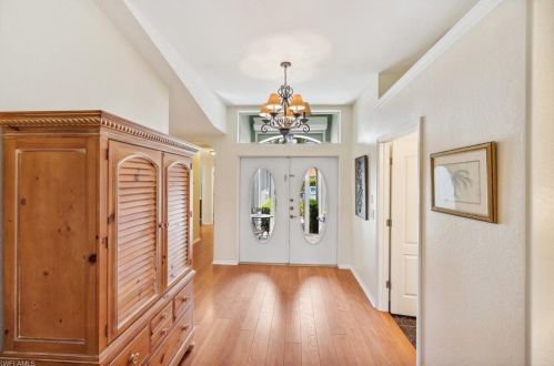 1507 Whispering Oaks Cir, Naples, FL 34110-4140
