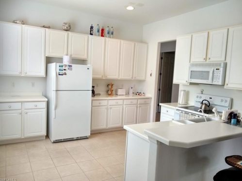 2156 Oxford Ridge Cir, Lehigh Acres, FL 33973-6057