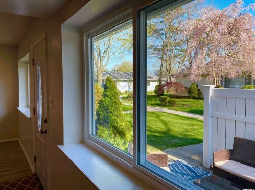 63 Storm Dr, Holtsville NY  11742-1909 exterior