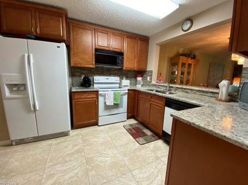 709 Landover Cir, Naples, FL 34104-7804