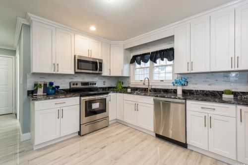 8 Prince Ln, Westbury NY  11590-6229 exterior