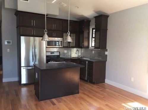 94-27 87th St, Jamaica, NY 11416-1301