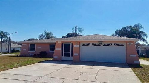 5742 Dolores Dr, Tarpon Springs, FL 34690-2323