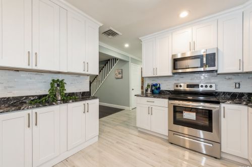 8 Prince Ln, Westbury NY  11590-6229 exterior