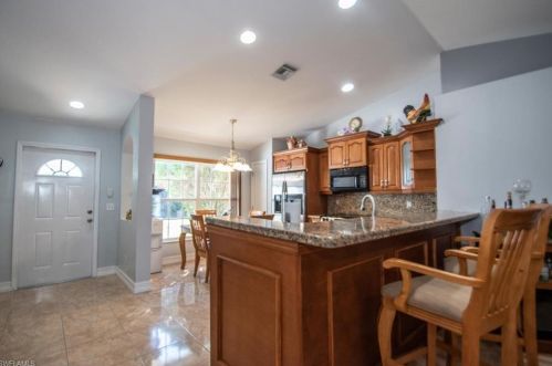 105 Zona Ave, Lehigh Acres FL 33971-1836 exterior