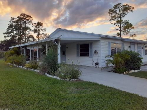 50 Dawn Flower Cir, Lehigh Acres FL 33936-0073 exterior