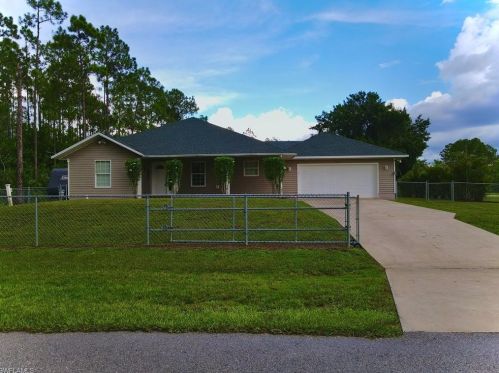 107 Oar Ct, Lehigh Acres, FL 33974-0430