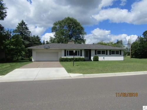 911 8th St, Scanlon, MN 55720-2560