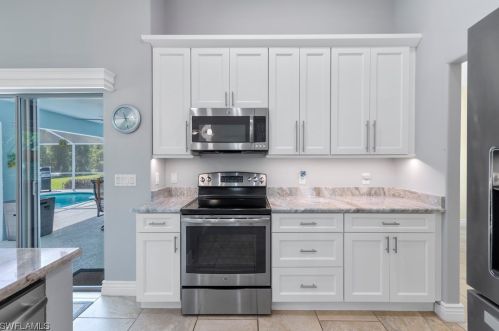 23463 Olde Meadowbrook Cir, Bonita Springs FL 34134-9132 exterior