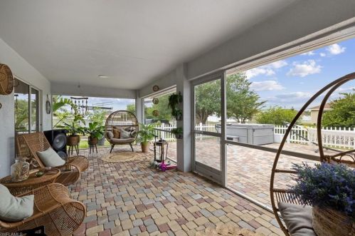 1023 Carl Ave, Lehigh Acres FL 33971-8523 exterior