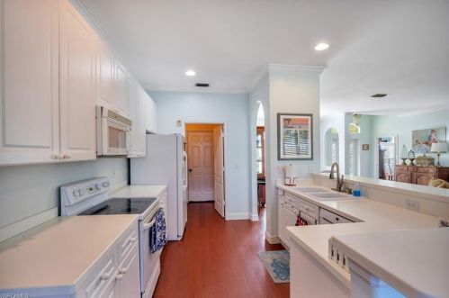 23379 Olde Meadowbrook Cir, Bonita Springs FL 34134-9115 exterior