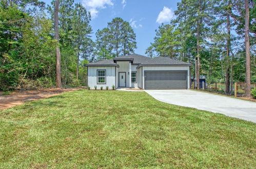 11098 Magnolia Dr, Plantersville, TX 77363-7801