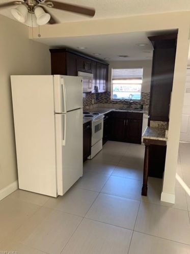 160 Turtle Lake Ct, Naples FL  34105-5562 exterior