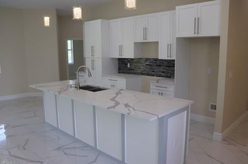 827 Sunrise Blvd, Lehigh Acres FL 33974-9795 exterior