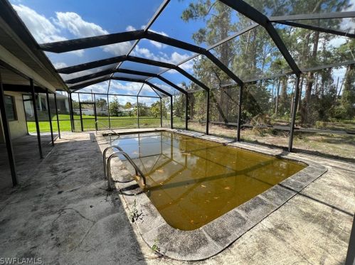 305 Robert Ave, Lehigh Acres FL 33972-1712 exterior