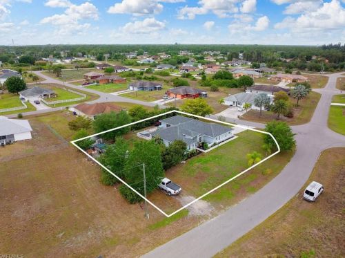 1023 Carl Ave, Lehigh Acres FL 33971-8523 exterior