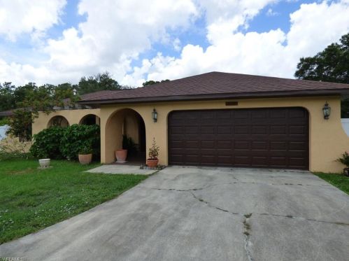 313 Mcarthur Ave, Lehigh Acres, FL 33936-1651