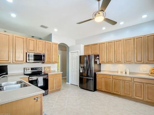 5690 Lago Villaggio Way, Naples FL  34104-5739 exterior