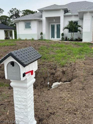 2104 Dixie Way, Lehigh Acres, FL 33972-8731