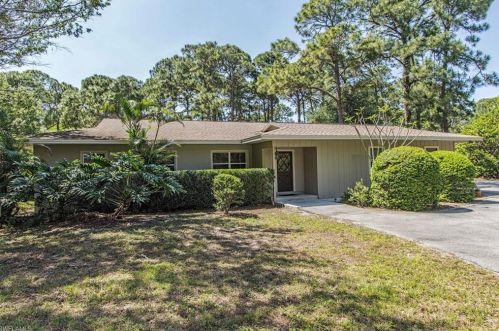 131 Cajeput Dr, Naples FL  34108-2614 exterior