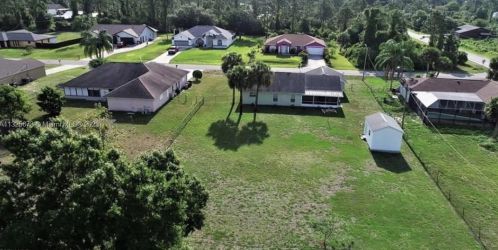203 Mcarthur Ave, Lehigh Acres, FL 33936-1649