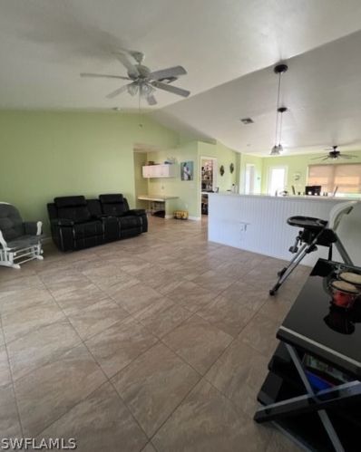 1041 Cedartree Ave, Lehigh Acres FL 33971-7590 exterior