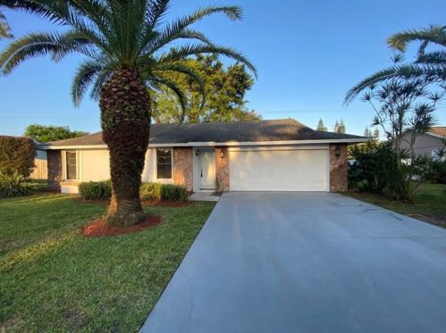 218 Parkwood Dr, West Palm Beach, FL 33411-8201