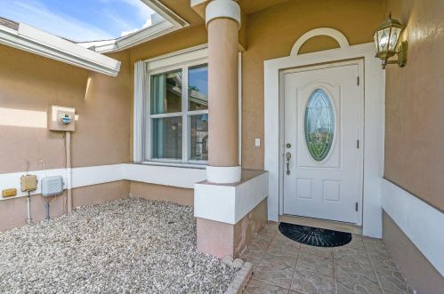 104 Royal Pine Cir, West Palm Beach, FL 33411-8672