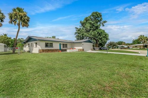 116 Lake Dr, Lehigh Acres, FL 33936-6908
