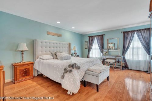 142 Serpentine Dr, Morganville NJ  07751-1400 exterior