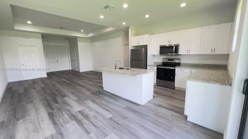 546 Aspen Ave, Lehigh Acres FL 33974-9613 exterior