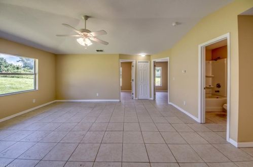 217 Ivan Ave, Lehigh Acres FL 33973-2011 exterior