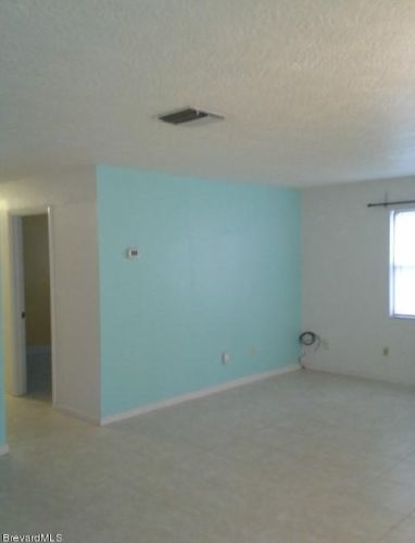 410 Tropical Trl, Merritt Island, FL 32952-4947