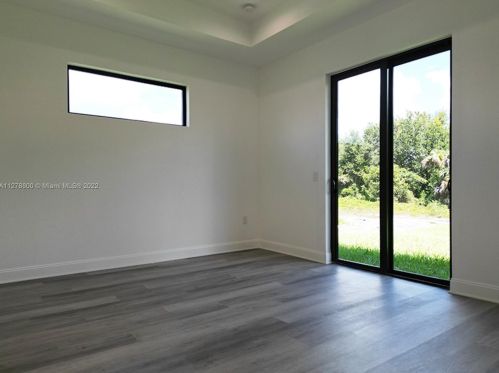 546 Aspen Ave, Lehigh Acres FL 33974-9613 exterior